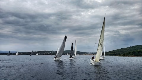 Yachts on the Round Long Island Race course under a cloudy sky